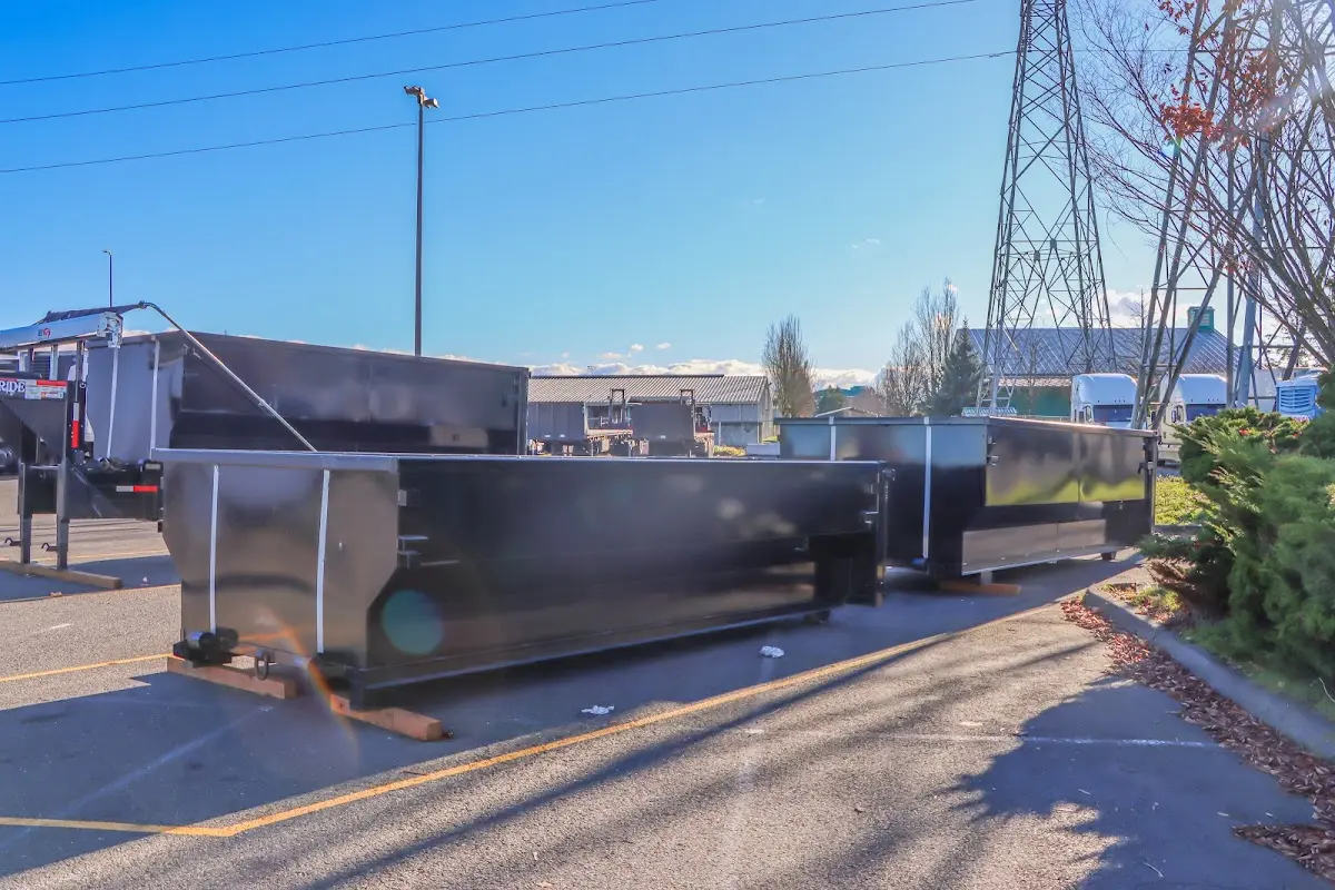 Roll-off dumpster ready for waste disposal at job site for 3 Yard Dumpster Rental in Enterprise